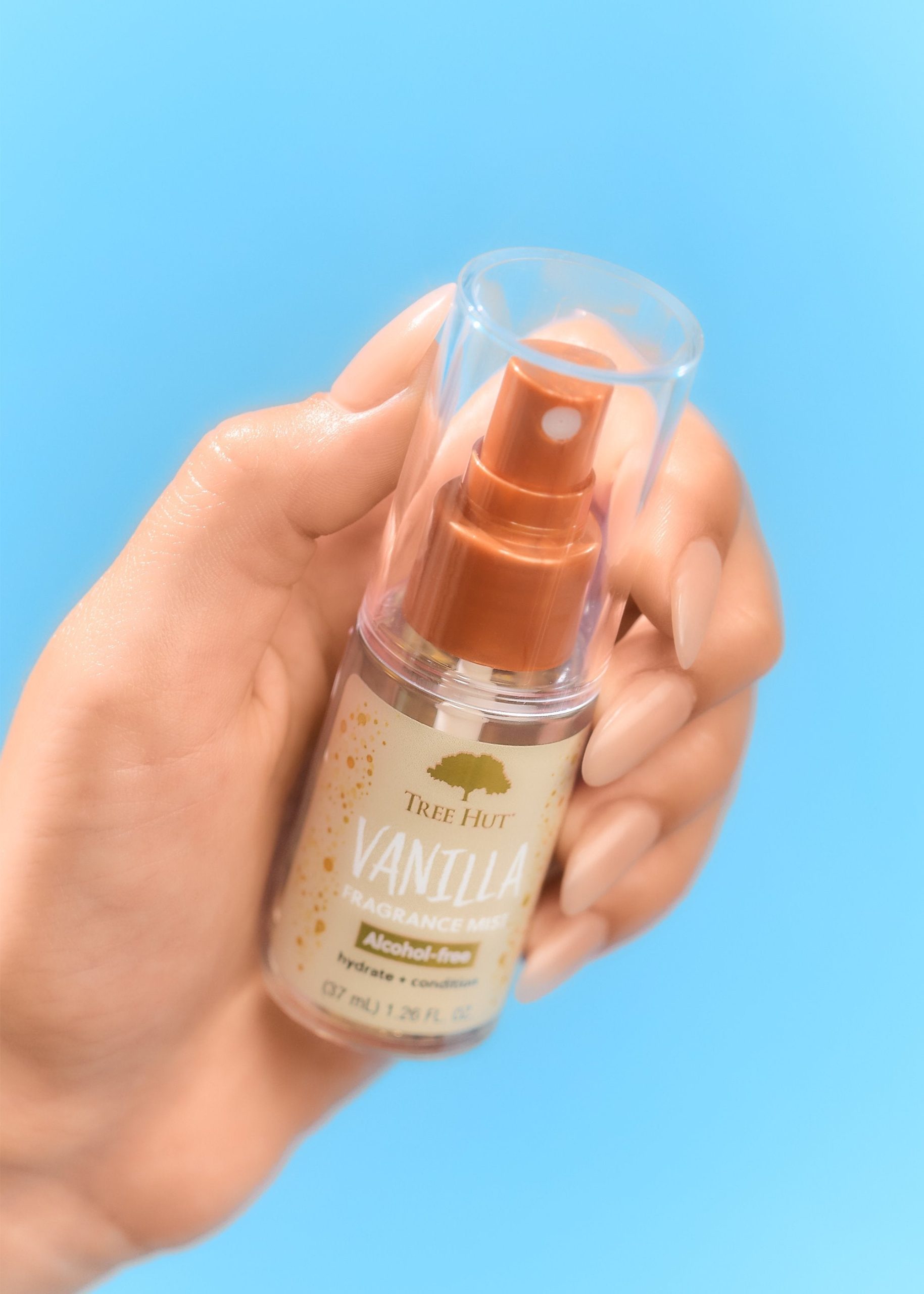 Tree-Hut-Vanilla-Mini-FragranceMist-InHand-Holiday26-5x7-7072_d80f5da4-5b6e-406c-92f6-598f0d3631d4-scaled-1.jpg